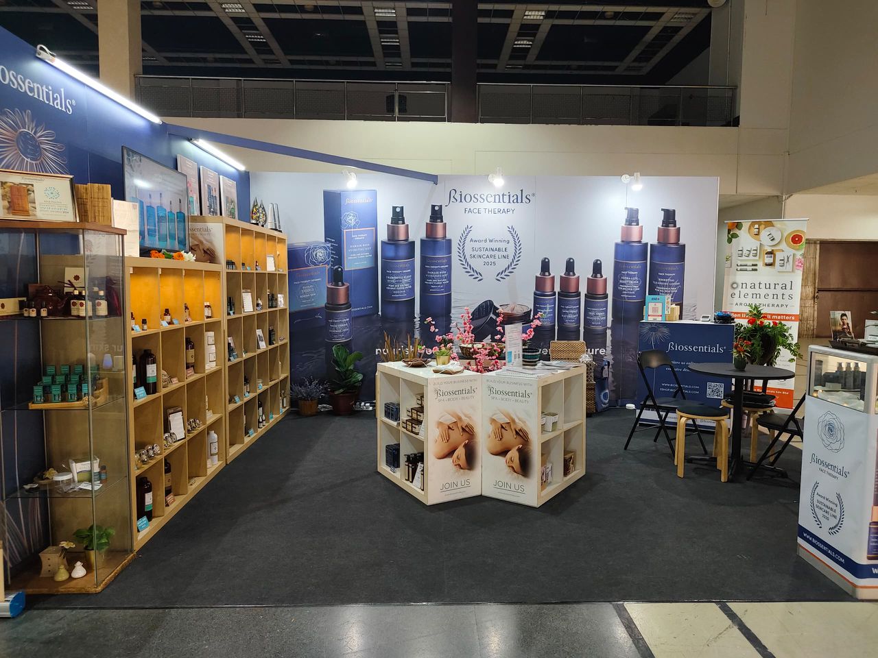 Biossentials exhibition booth displaying professional spa, aromatherapy and facial products